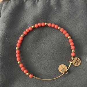 Gold and coral bangle